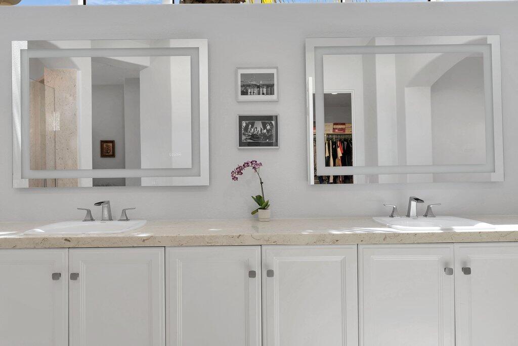 79860 Tangelo La Quinta, CA 92253 - Photo 25 of 45 a bathroom with a sink and a mirror