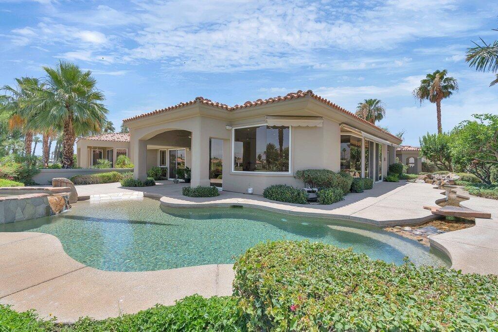 79860 Tangelo La Quinta, CA 92253 - Photo 30 of 45 a front view of a house with a yard