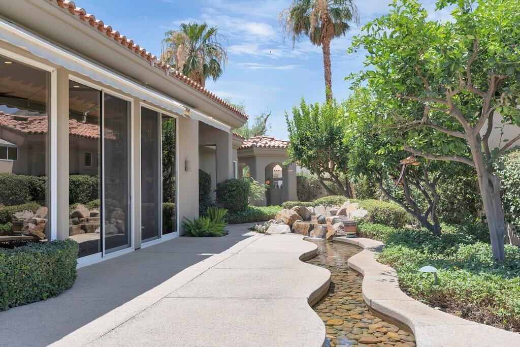 79860 Tangelo La Quinta, CA 92253 - Photo 32 of 45 a view of a house with sitting area and garden
