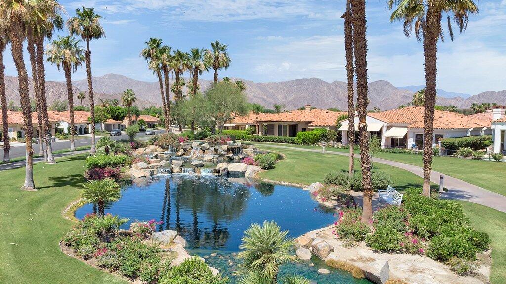 79860 Tangelo La Quinta, CA 92253 - Photo 44 of 45 a view of a lake with a yard and lake view