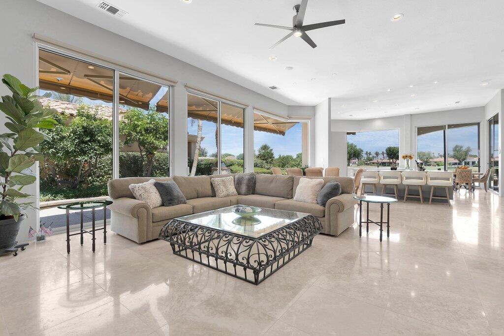 79860 Tangelo La Quinta, CA 92253 - Photo 8 of 45 a living room with furniture and a large window