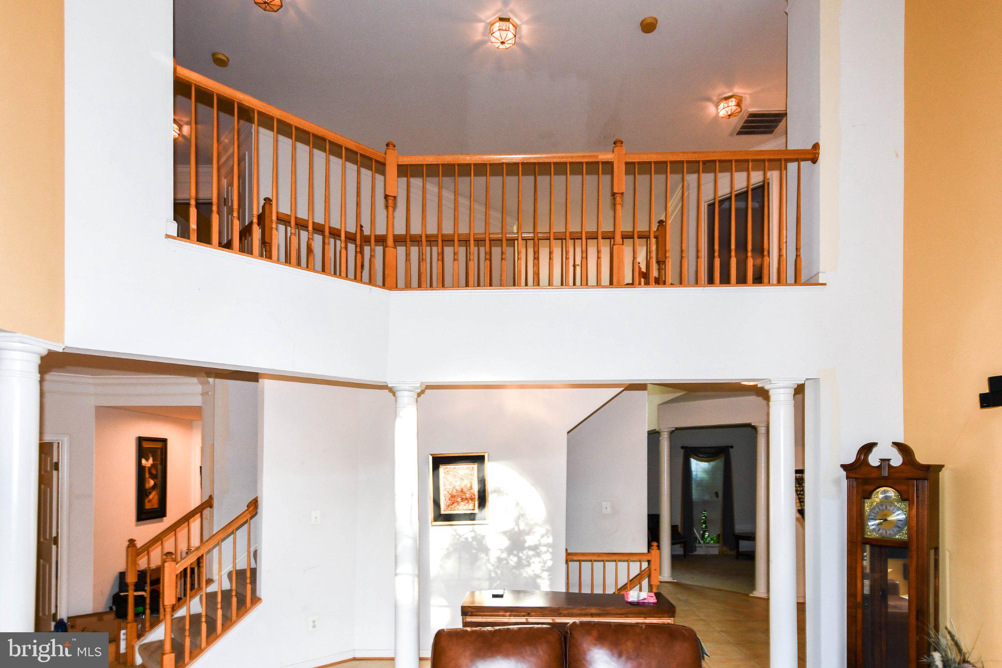 3208 Clavier Place Clinton, MD 20735 - Photo 54 of 55 Spacious foyer with elegant railings.