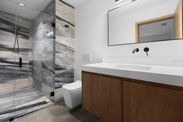 a bathroom with a sink and a toilet