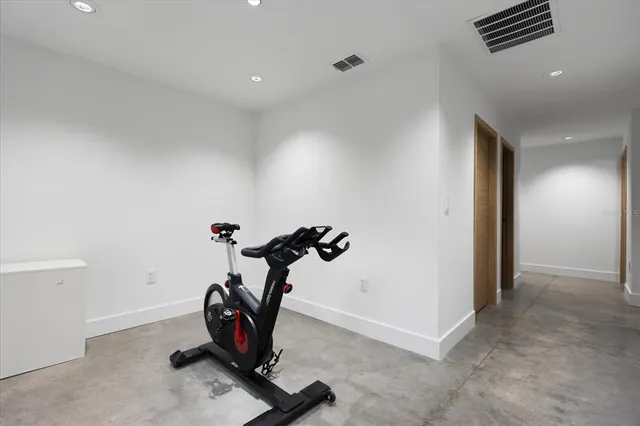 a view of a room with gym equipment