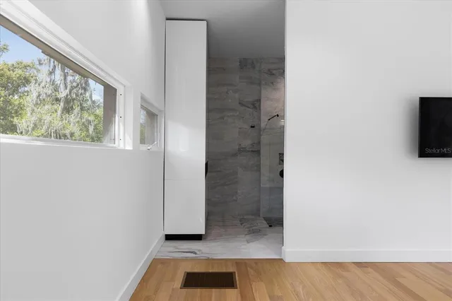 an empty room with windows