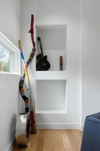 a view of entryway with wooden floor