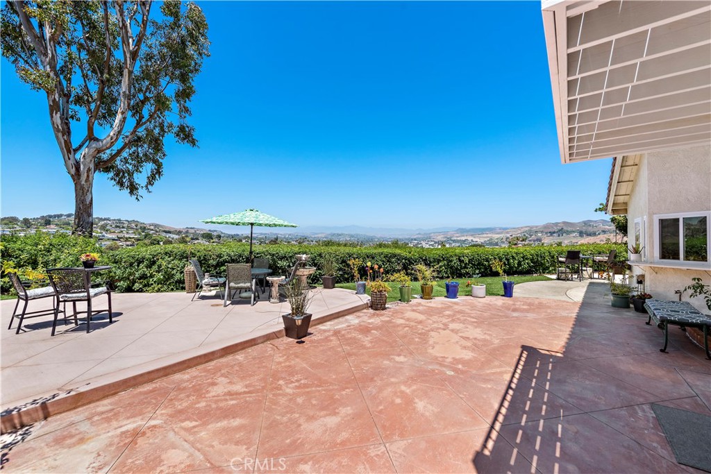 33622 Via Martos Dana Point, CA 92629 - Photo 20 of 46 a view of a patio with a table and chairs
