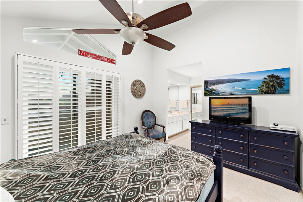 33622 Via Martos Dana Point, CA 92629 - Photo 30 of 46 a bedroom with a bed and a flat screen tv