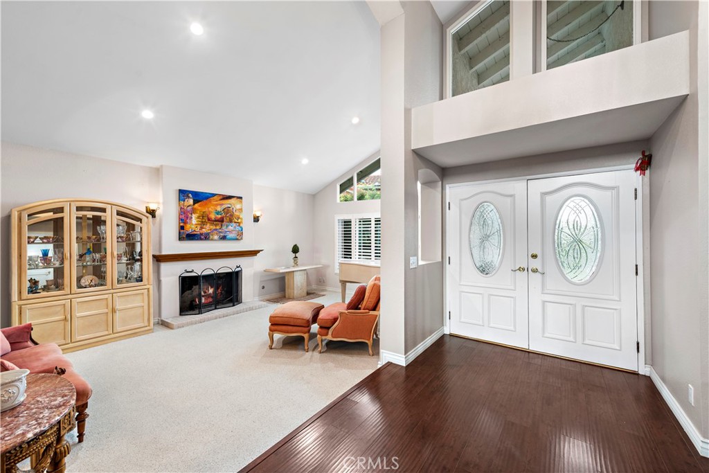 33622 Via Martos Dana Point, CA 92629 - Photo 6 of 46 a living room with furniture and a fireplace
