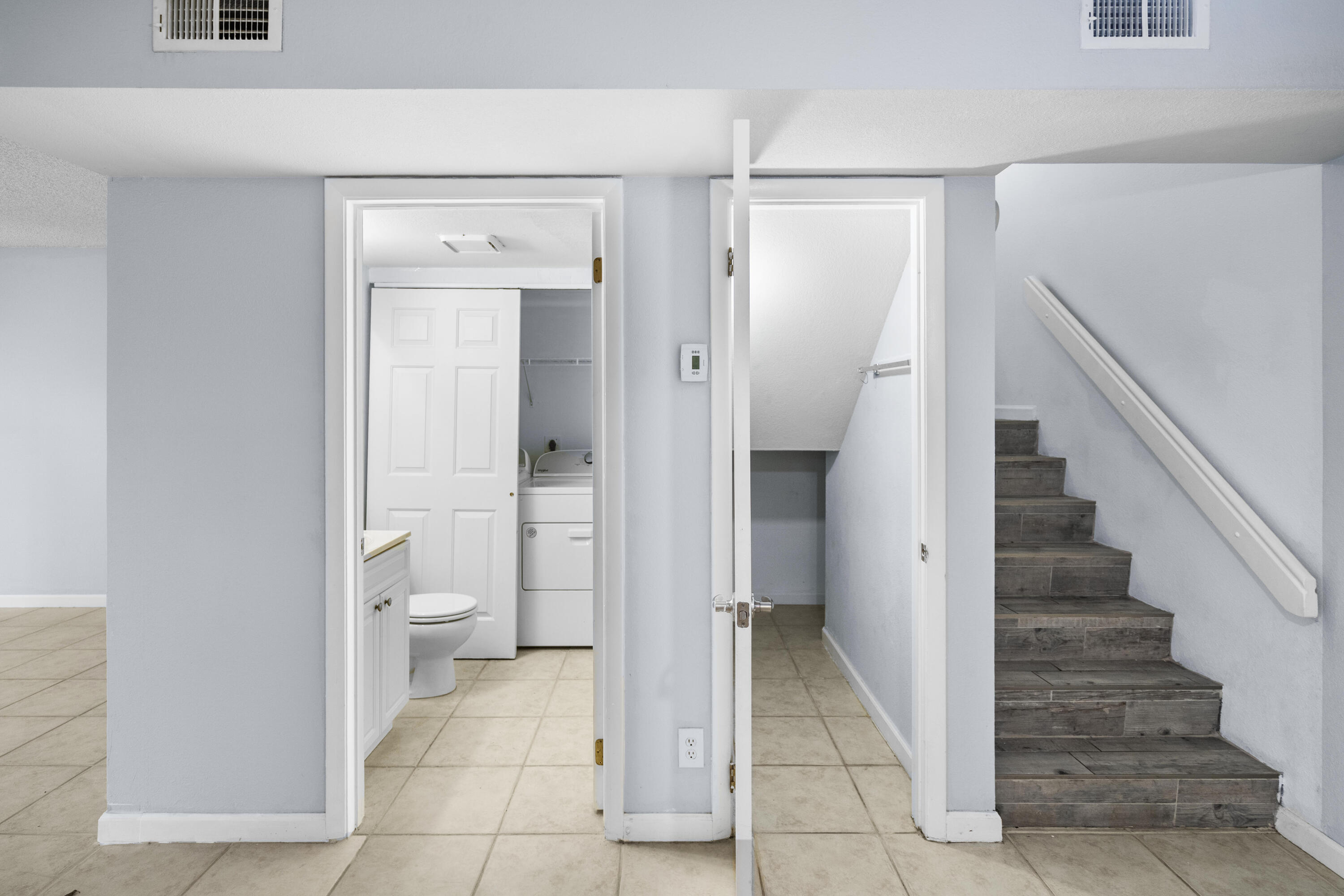 8237 Severn Drive, Unit A Boca Raton, FL 33433 - Photo 8 of 19 a bathroom with a toilet and a shower