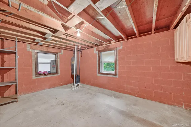 a view of empty room with windows