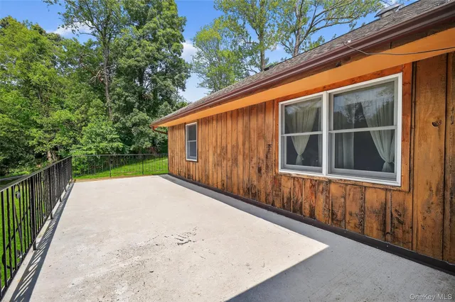a view of a back yard of the house