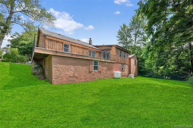 a view of backyard with green space