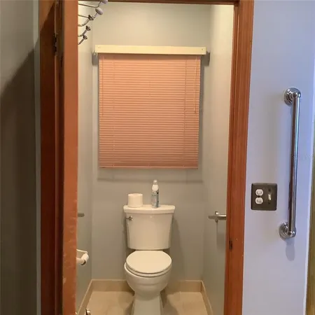 a view of a backyard with a tub and entertaining space