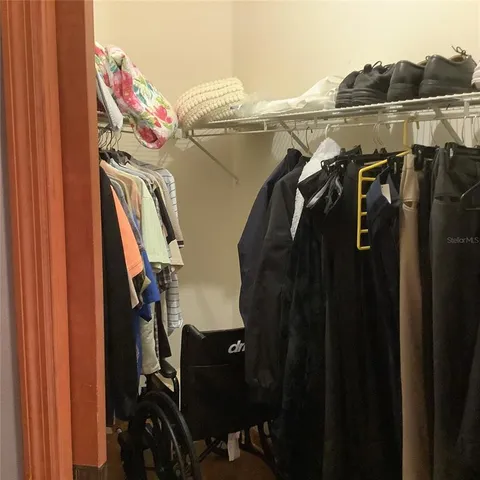 a view of a backyard with a tub and entertaining space