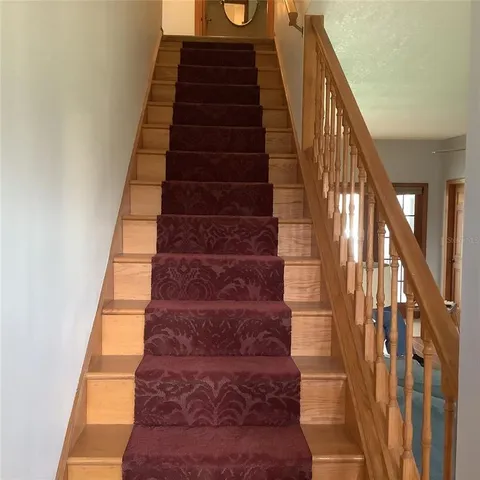 a bathroom with a shower curtain and a shower curtain