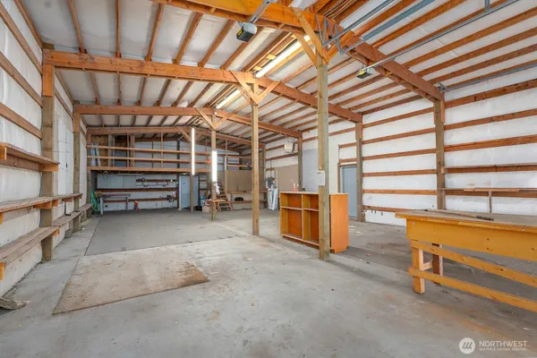 a view of a room with wooden walls