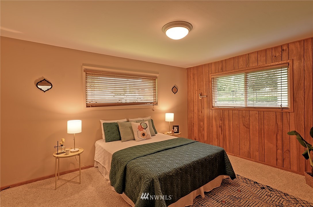 337 View Ridge Drive Everett, WA 98203 - Photo 23 of 38 a bedroom with a bed and wooden floor
