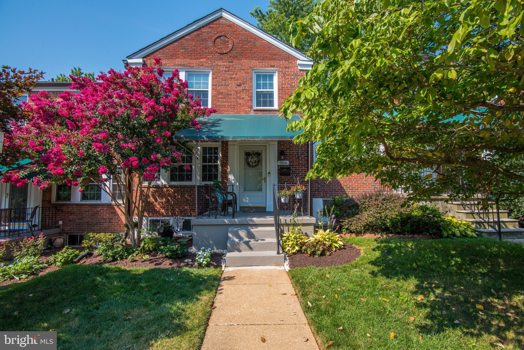 506 Academy Road Baltimore, MD 21228 - Photo 3 of 49 a front view of a house with yard