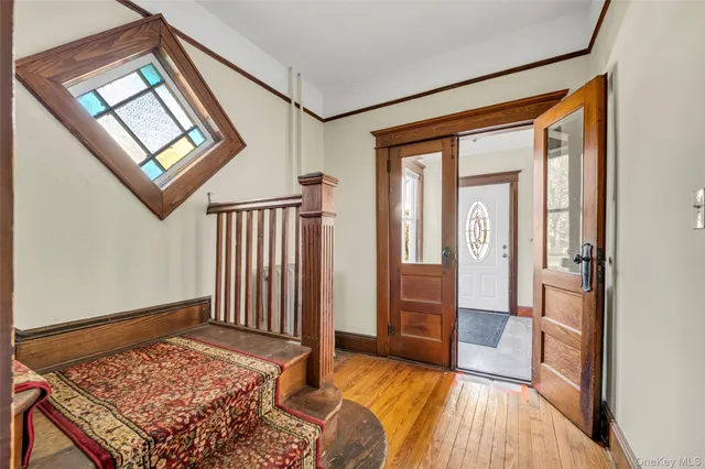 a view of livingroom with hardwood floor and hallway