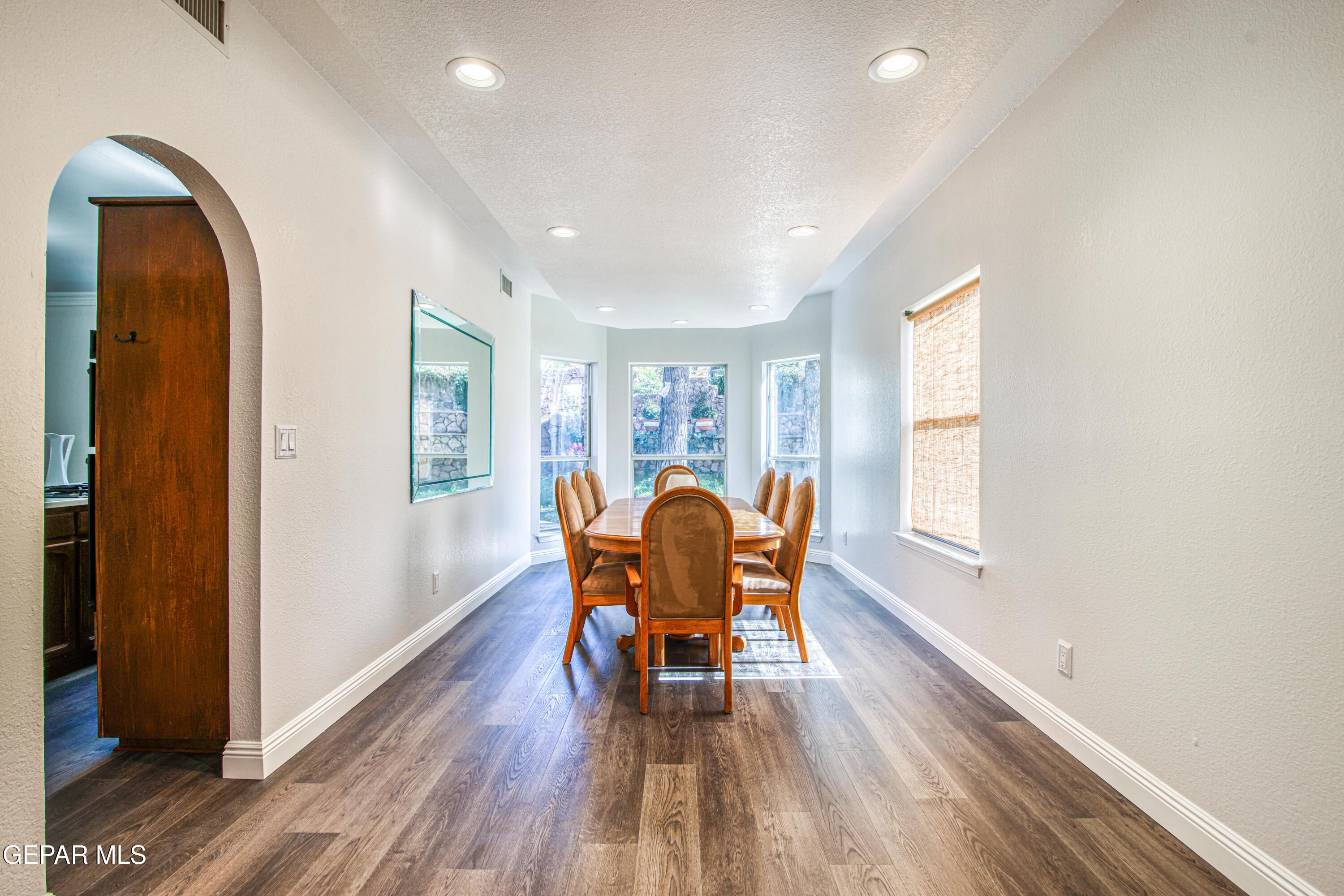 6620 Imperial Ridge Drive El Paso, TX 79912 - Photo 11 of 50 a dining room with furniture and wooden floor