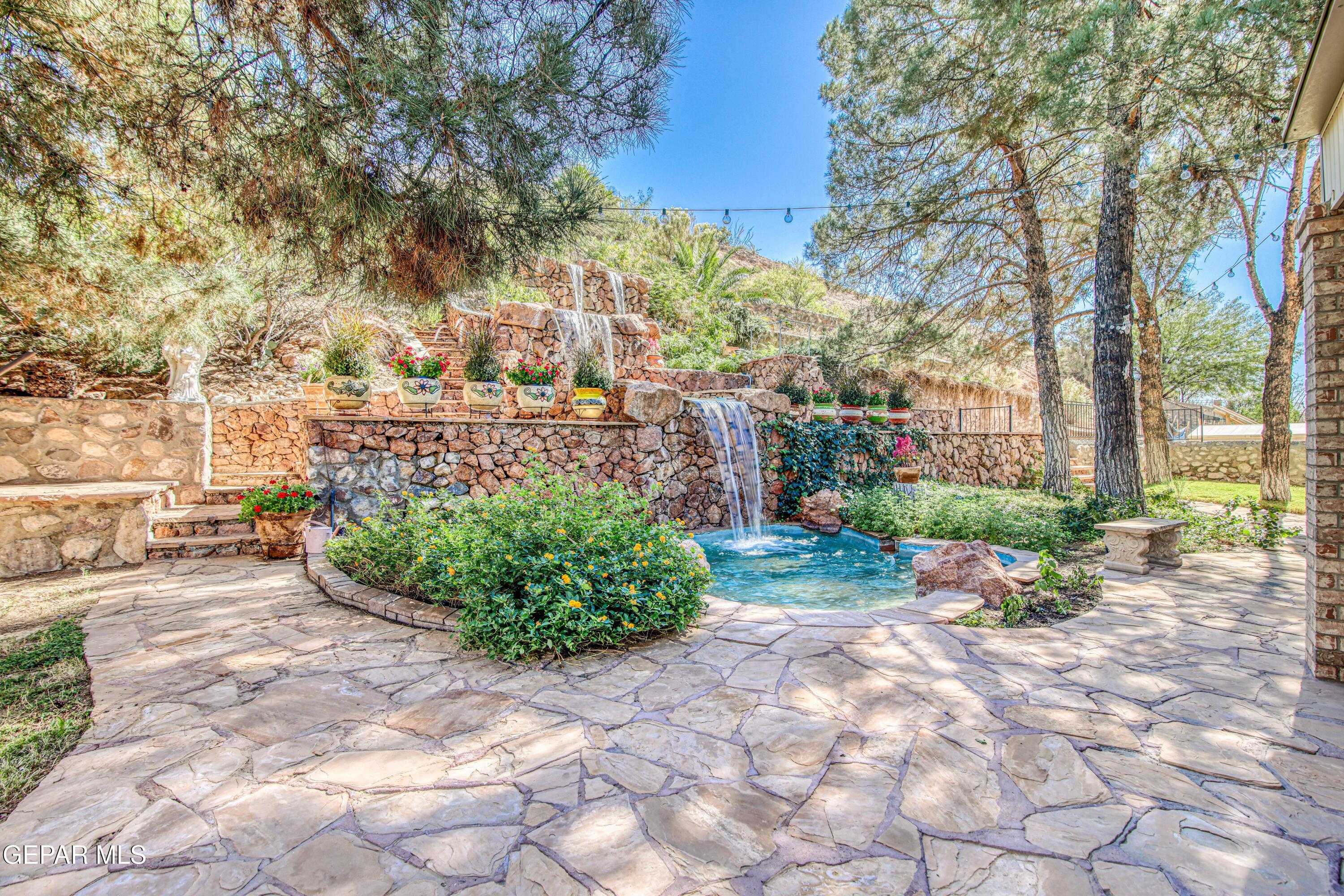 6620 Imperial Ridge Drive El Paso, TX 79912 - Photo 4 of 50 a view of a backyard with sitting area