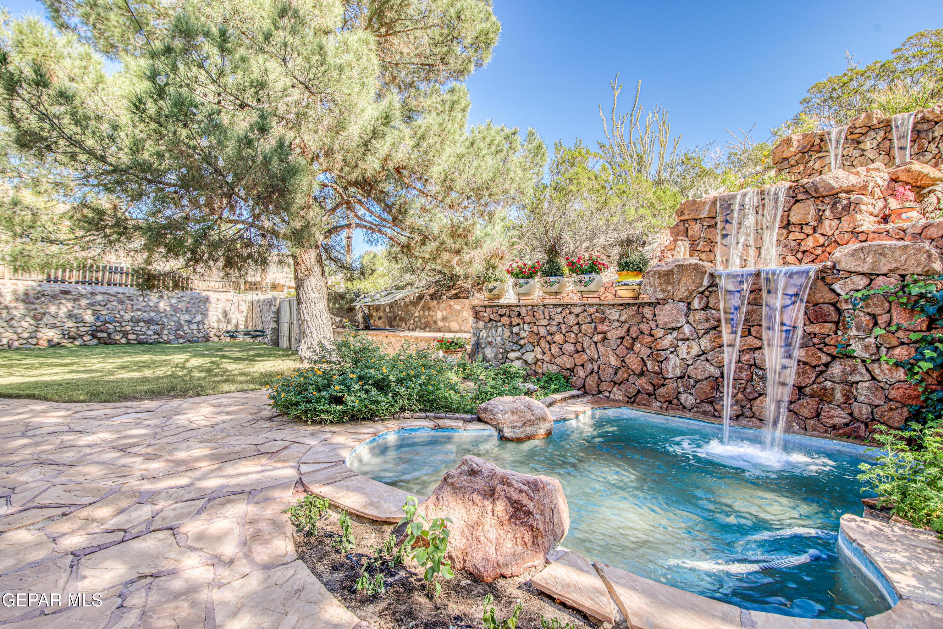 6620 Imperial Ridge Drive El Paso, TX 79912 - Photo 47 of 50 a view of a garden with an outdoor space