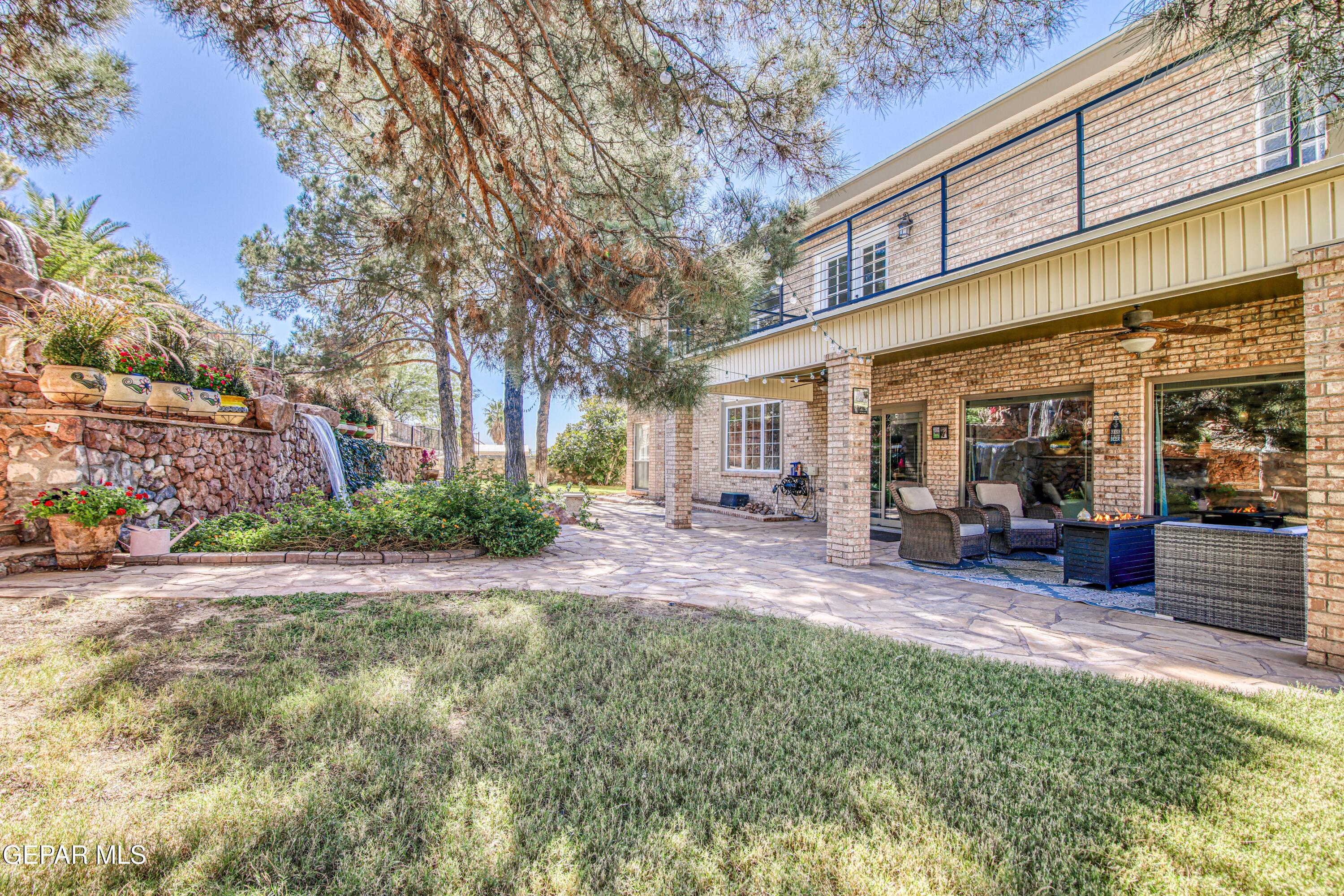 6620 Imperial Ridge Drive El Paso, TX 79912 - Photo 48 of 50 a view of a house with backyard and sitting area
