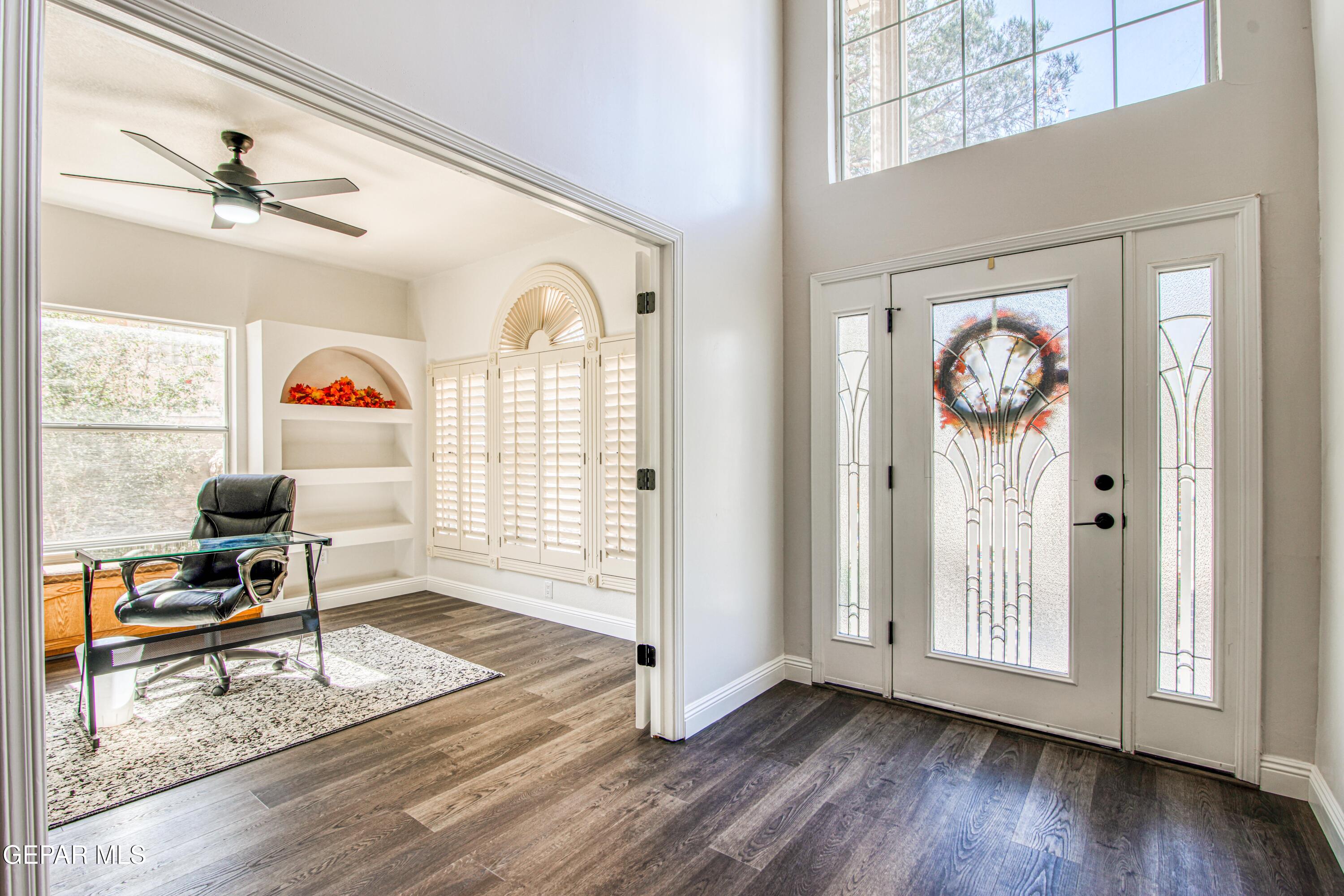 6620 Imperial Ridge Drive El Paso, TX 79912 - Photo 9 of 50 a view of an entryway with wooden floor