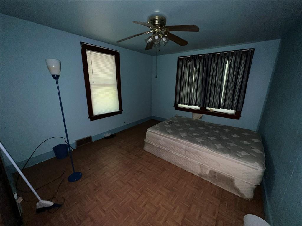 143 Coal Valley Road Clairton, PA 15025 - Photo 16 of 37 a bedroom with a bed and a window