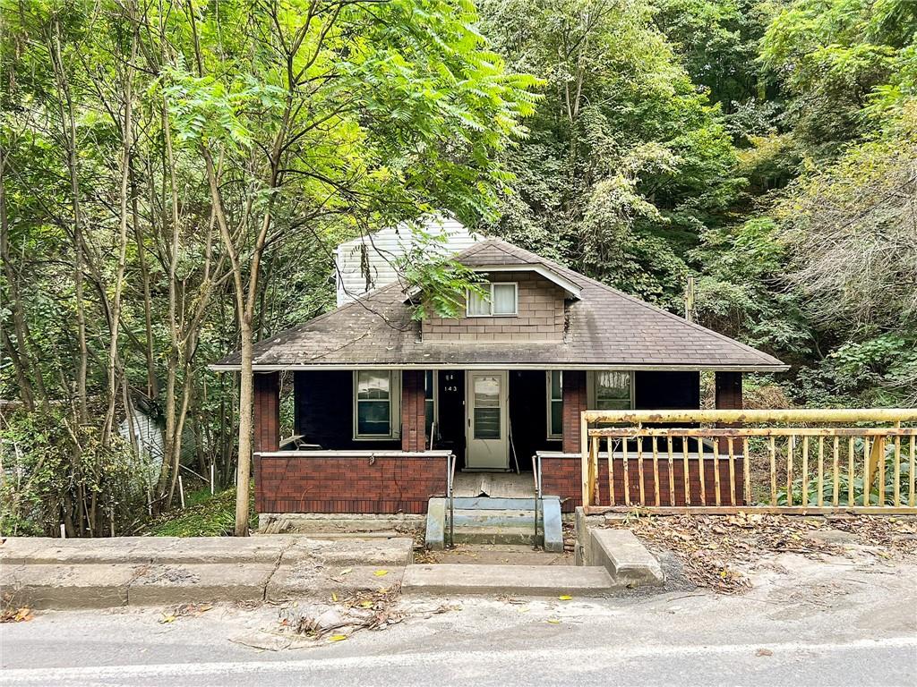 143 Coal Valley Road Clairton, PA 15025 - Photo 2 of 37 a view of a house with a porch
