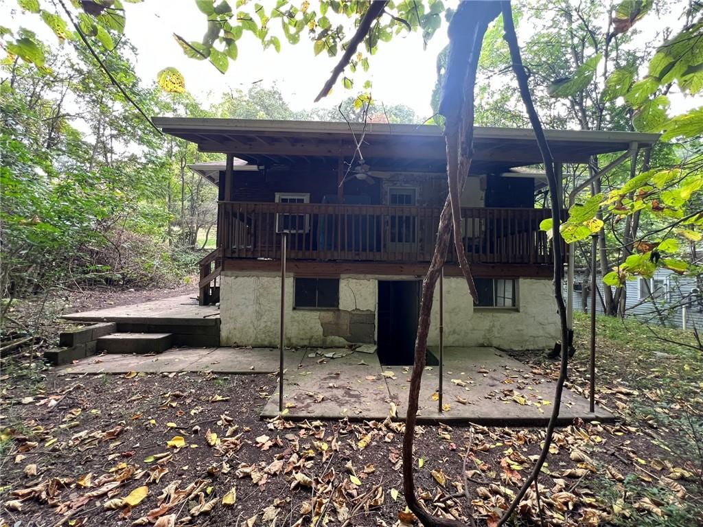 143 Coal Valley Road Clairton, PA 15025 - Photo 25 of 37 a backyard of a house with table and chairs
