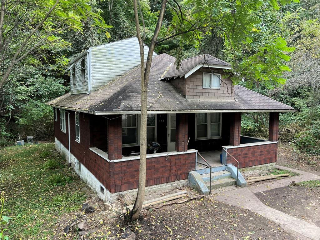 143 Coal Valley Road Clairton, PA 15025 - Photo 34 of 37 a view of house with backyard and sitting area