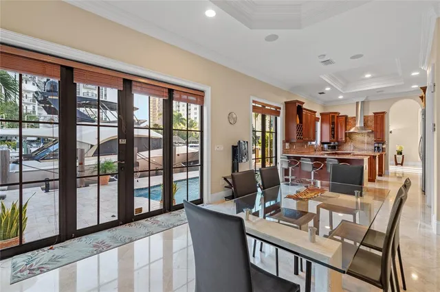 a bathroom with a sink and mirror with toilet