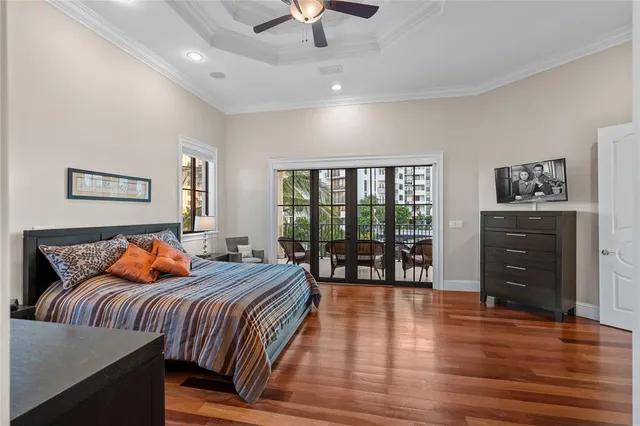 a view of balcony with chairs and wooden fence
