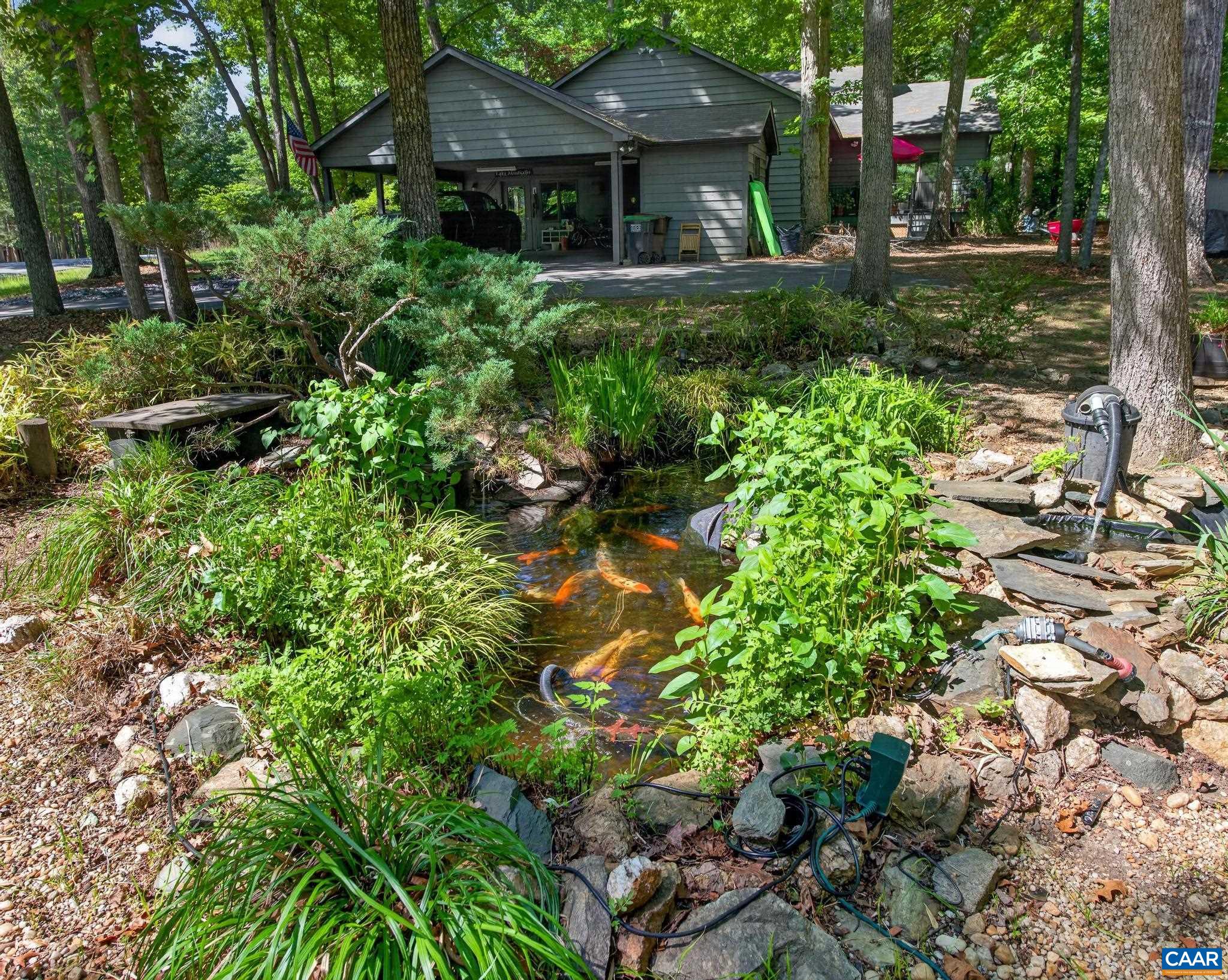 54 Amethyst Road Palmyra, VA 22963 - Photo 26 of 66 Screened Porch. The sound of the water is so soothing!
