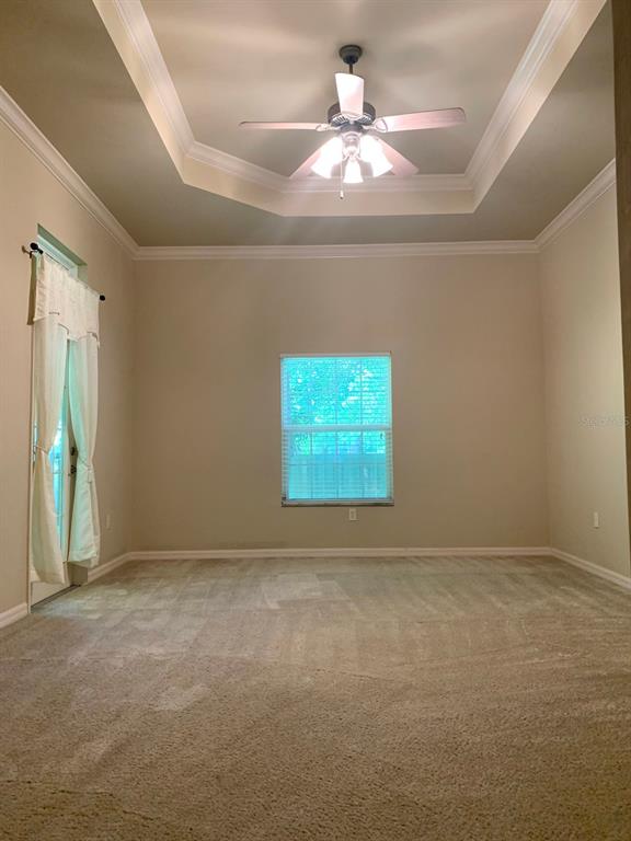 8559 Southwest 11th Road Gainesville, FL 32607 - Photo 13 of 19 en empty room with windows