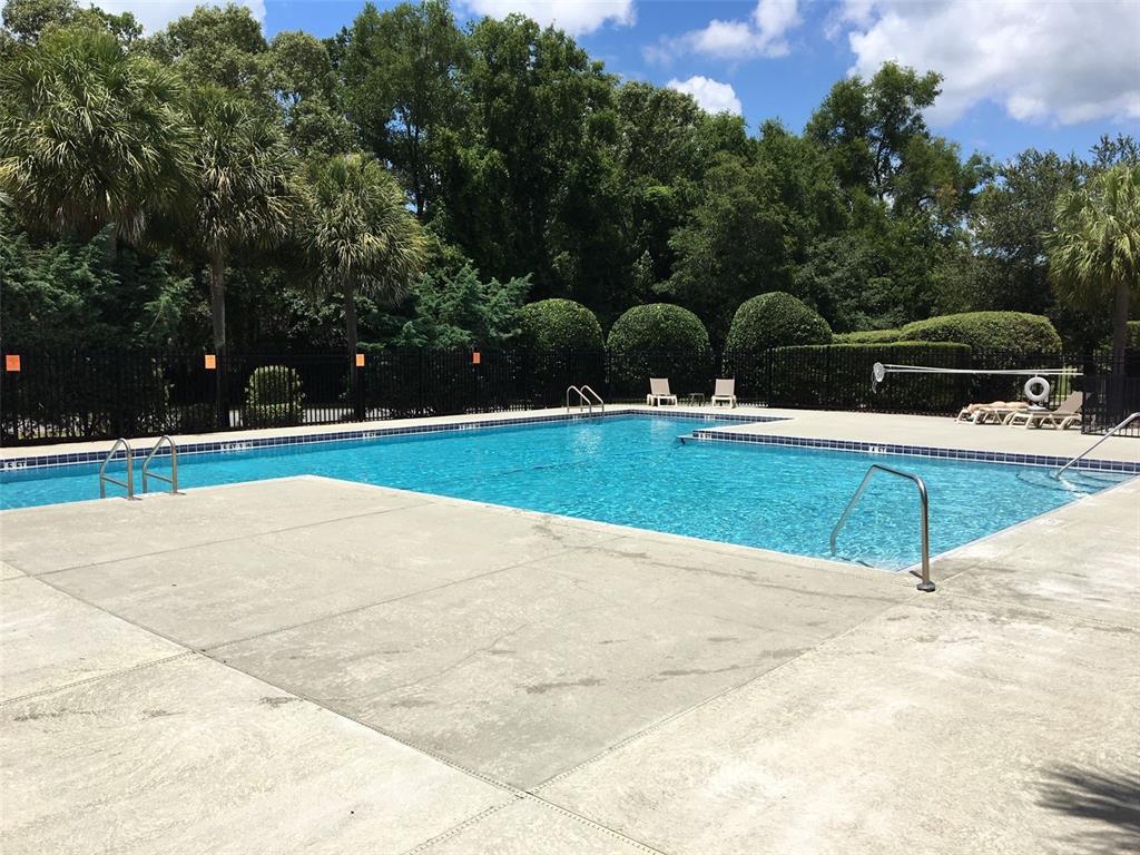 8559 Southwest 11th Road Gainesville, FL 32607 - Photo 16 of 19 a view of a swimming pool and an outdoor space