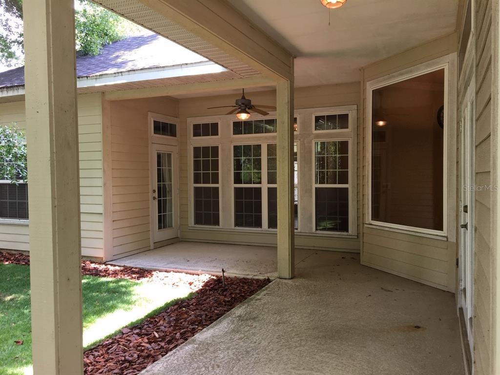 8559 Southwest 11th Road Gainesville, FL 32607 - Photo 2 of 19 front view of a house with a porch