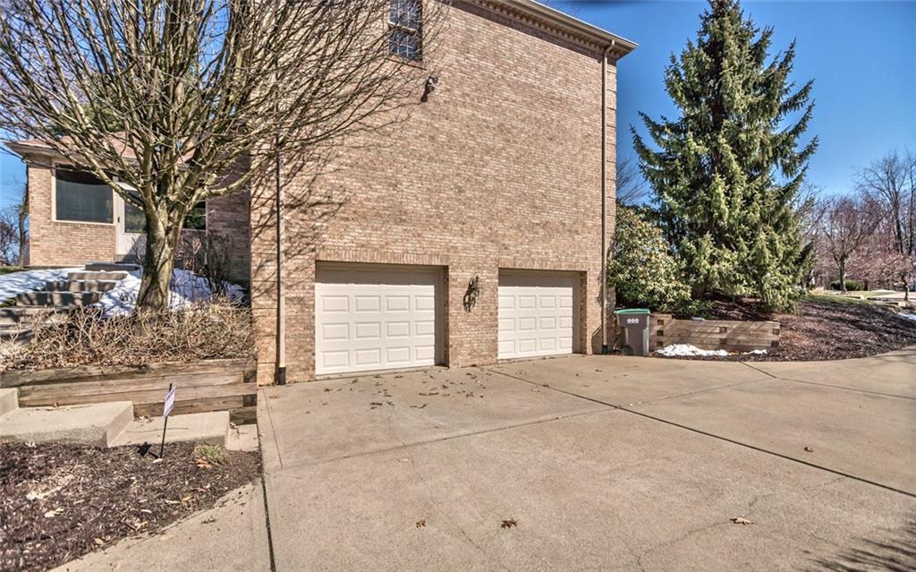 471 Pinkerton Road Wexford, PA 15090 - Photo 2 of 25 3 Car Side Entry Garage with Rear Porch access and Level Cement Driveway
