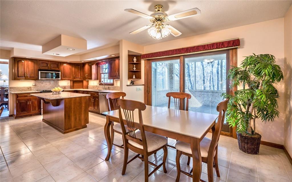 471 Pinkerton Road Wexford, PA 15090 - Photo 13 of 25 Sunny Breakfast Nook Overhead Lighted Ceiling Fan & Glass Doors to the Covered Rear Porch