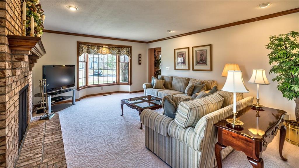 471 Pinkerton Road Wexford, PA 15090 - Photo 16 of 25 Spacious Familyroom open to Kitchen with Ceiling-to-Floor Masonry Fireplace & Bayed Window