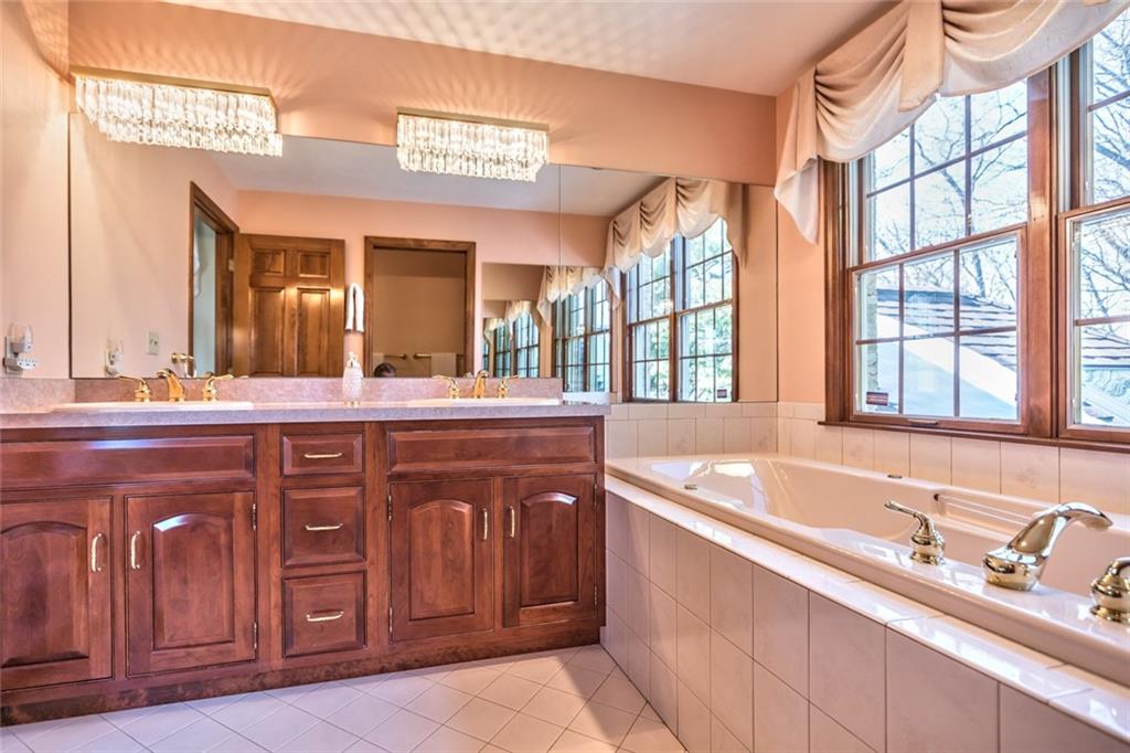 471 Pinkerton Road Wexford, PA 15090 - Photo 22 of 25 Private Master Whirlpool Bath, Double Bowl Vanity & Private Water Closet with Glass Door Shower