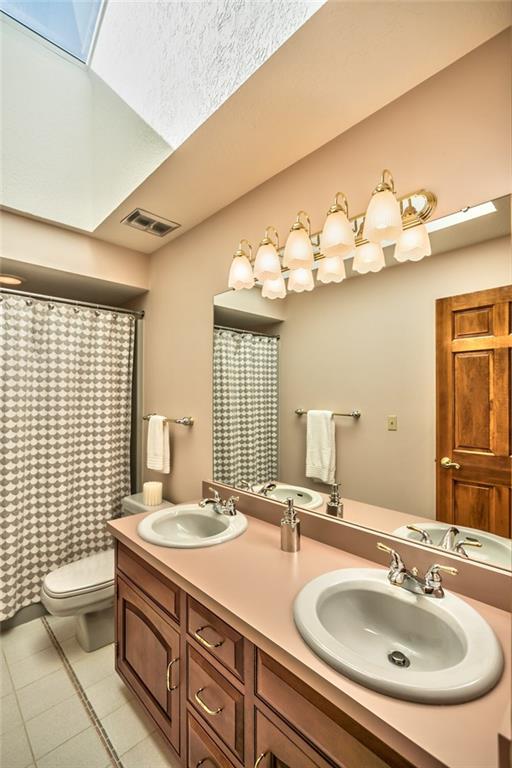 471 Pinkerton Road Wexford, PA 15090 - Photo 25 of 25 Vaulted 2nd Full Bath with Skylight and Double Bowl Vanity