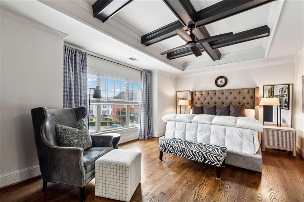 10296 Quadrant Court Alpharetta, GA 30022 - Photo 14 of 28 a bedroom with furniture and a large window