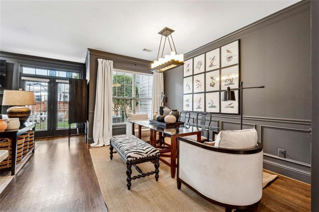 10296 Quadrant Court Alpharetta, GA 30022 - Photo 9 of 28 a living room with furniture and a large window