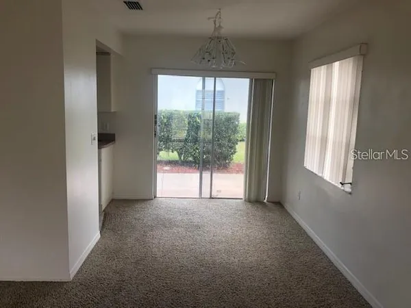 an empty room that has a window