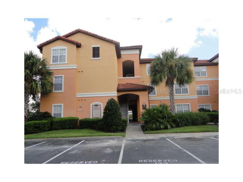 5455 Vineland Road, Unit 3208 Orlando, FL 32811 - Photo 1 of 1 a view of a house with a yard