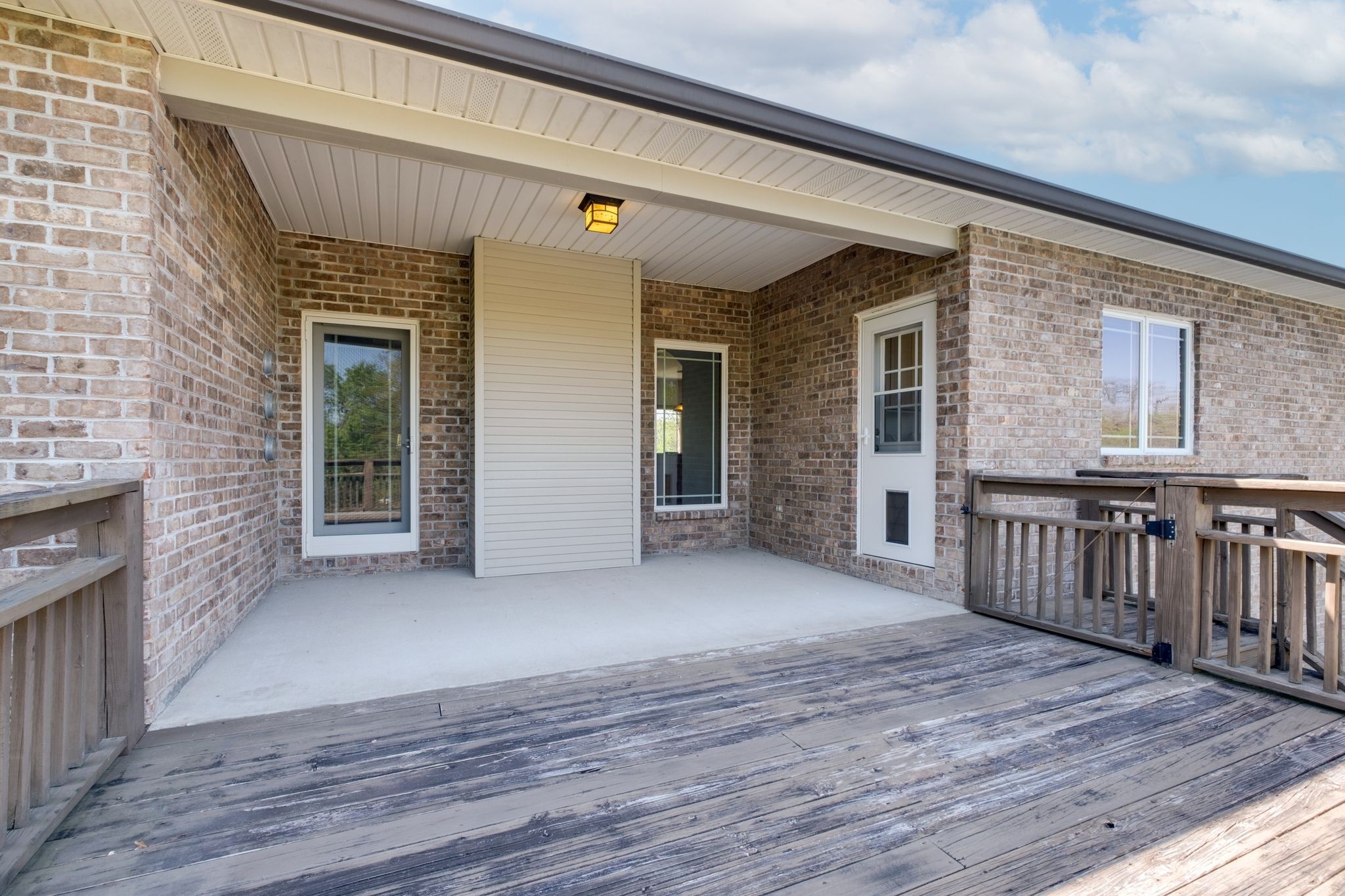 1249 White Road Bon Aqua, TN 37025 - Photo 52 of 60 a view of a porch with wooden floor and fence
