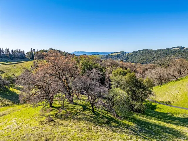 a view of a houses with a yard